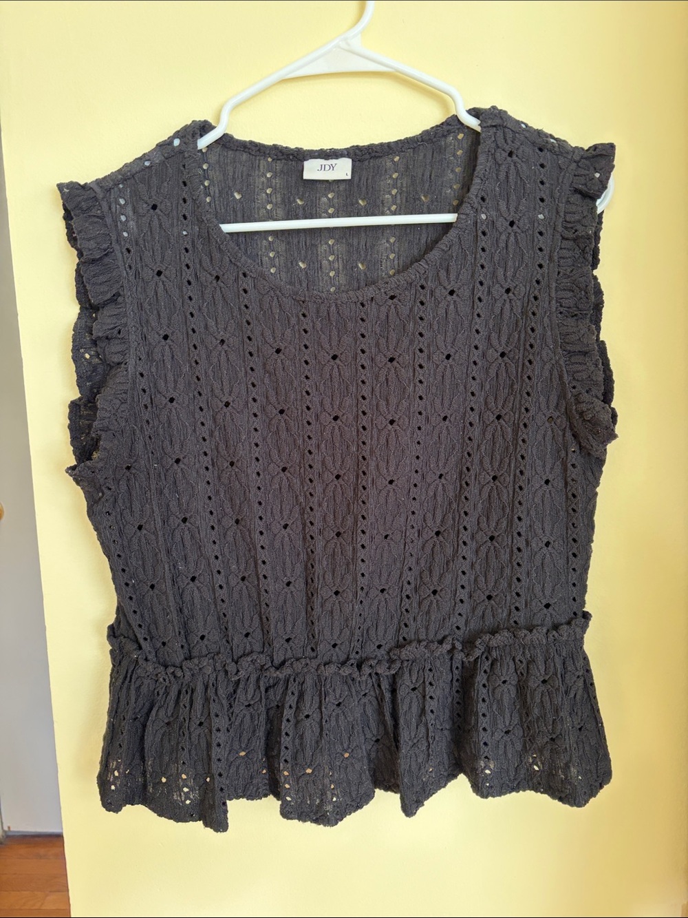 Black peplum eyelet top